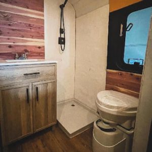Skoolies built By Nomadic Homes Bus Conversion Team